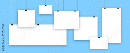 Blank hanging paper list gallery art vector. Isolated photo frame sheet on blue background. Portfolio concept, a4 paper template, poster and banner. Vector illustration.