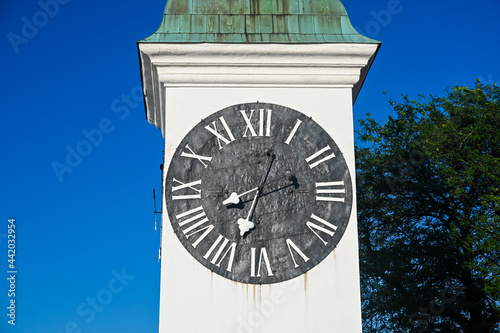 Clock tower in old town. Historical building. Petrovaradin castle, Novi Sad, Serbia.