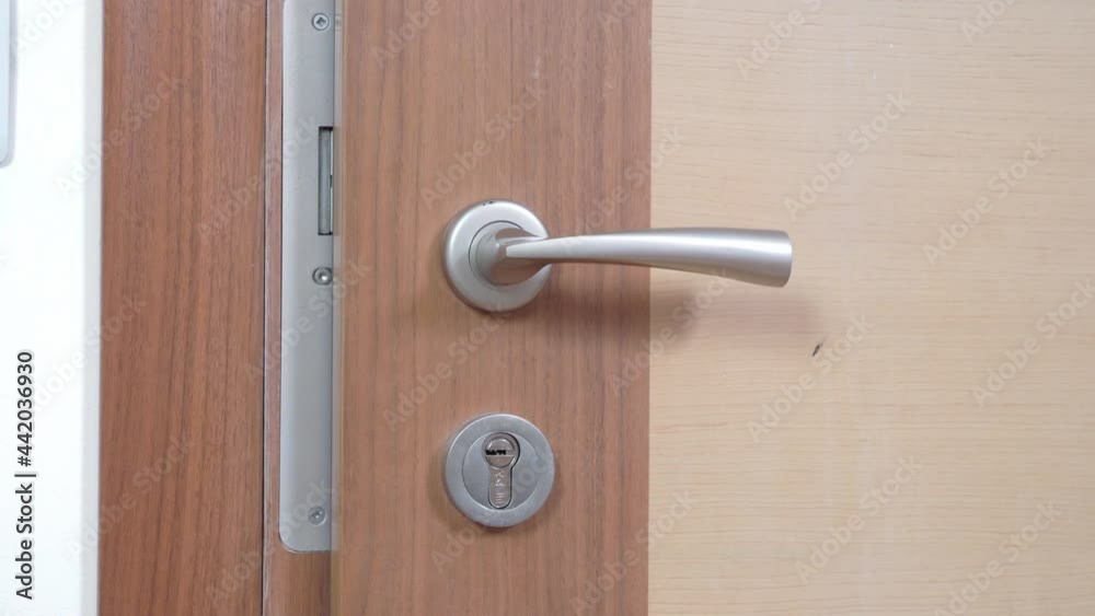 Person in white coat leaves house and door closes behind him, close up. Doctor came on call to home of patient. Paid and private medical services.