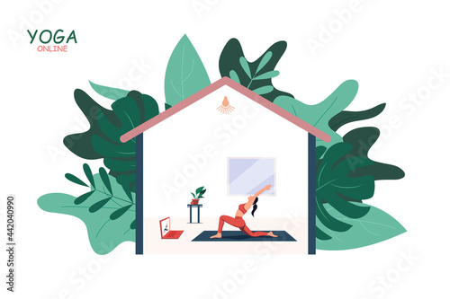 Woman doing yoga exercises at home on Quarantine with video lesson. Stay home, 2019-nCoV Novel Corona virus