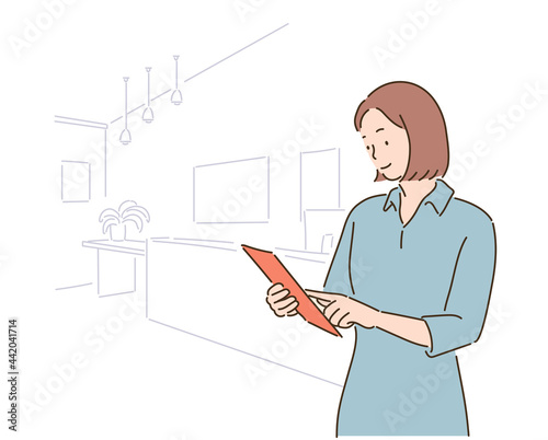 A business woman is looking at documents. hand drawn style vector design illustrations. 