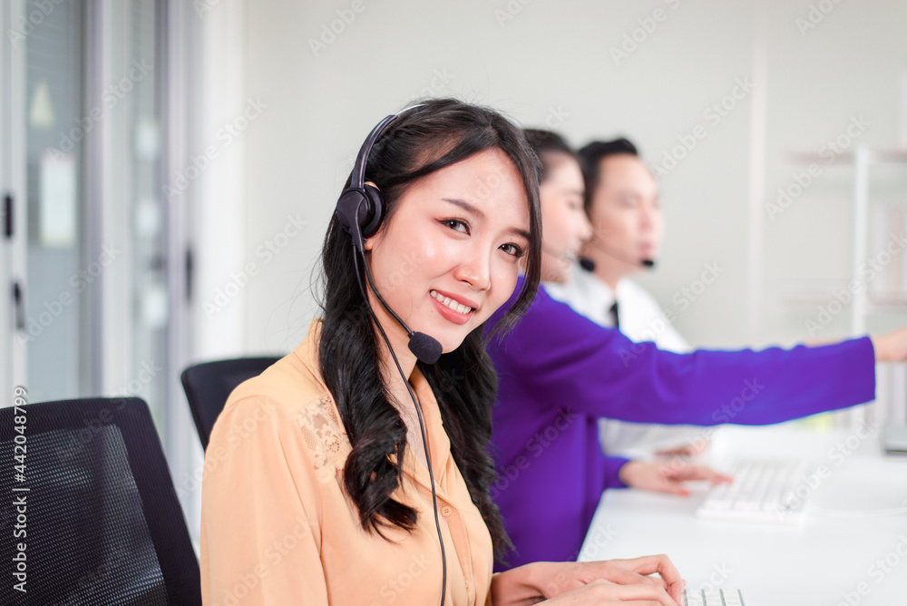 Call center asian woman operator working with headset at office,Beautiful asian employees women Call center asian woman operator working with headset at office,Beautiful asian employees women