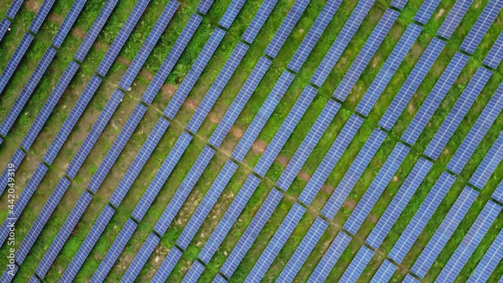 Solar Farm. Renewable Energy With Photovoltaic Panels. aerial top-down orbit Solar Farm. Renewable Energy With Photovoltaic Panels. aerial top-down orbit