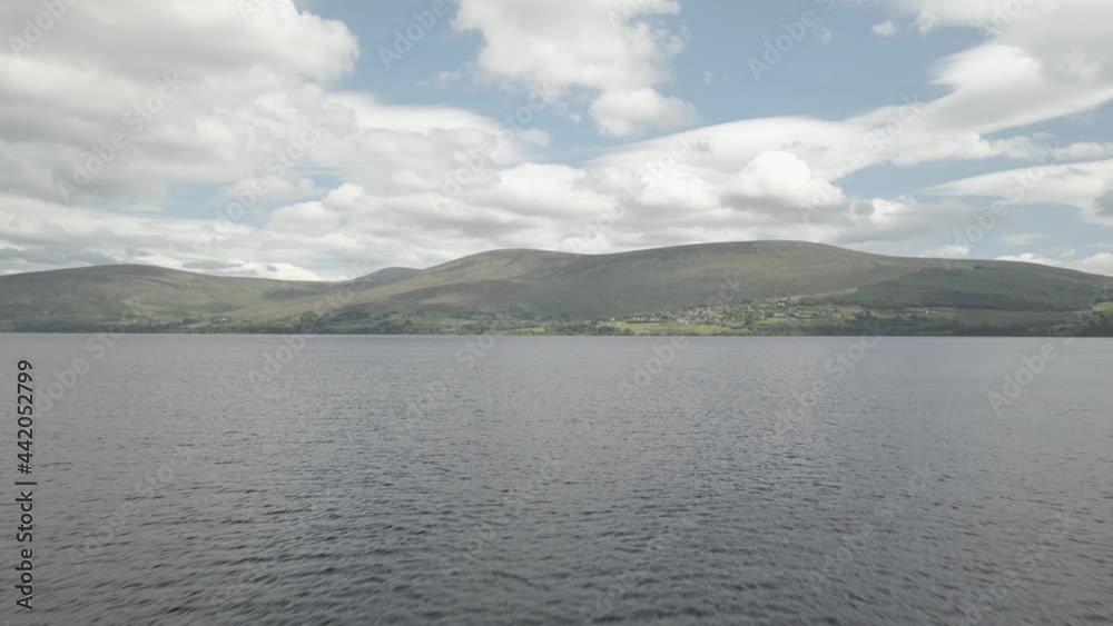 Scenic View Of Mountains And Sea In Blessington Lake In Wicklow Ireland - aerial shot Scenic View Of Mountains And Sea In Blessington Lake In Wicklow Ireland - aerial shot