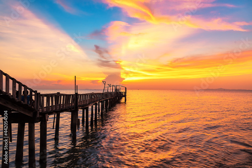 Landscape of Wooded bridge in the port between sunset