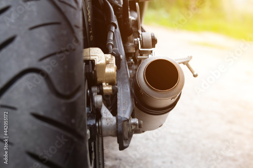 Close-up shot of motorcycle exhaust pipes.