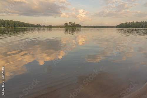 Summer seascape. Reflection of clouds in the sea. Nature of Scandinavia. Finland. Porvoo