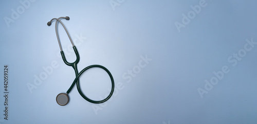 Принти на полотні Stethoscope on blue background with copy space.