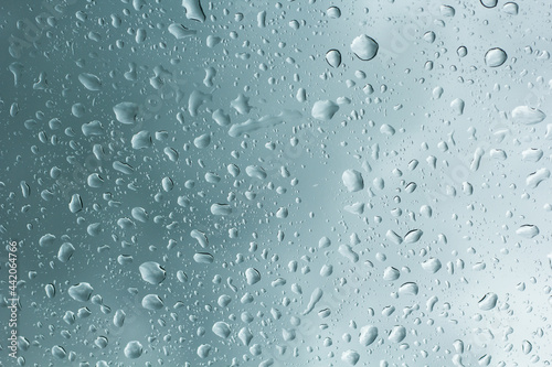 water drops on glass surface © saranyoo