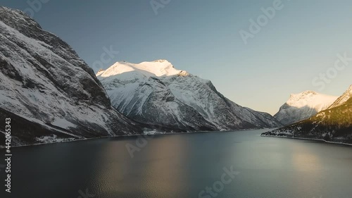 Scenic View Of Lake In Mountains During Winter In Eresfjord, Norway - static shot photo