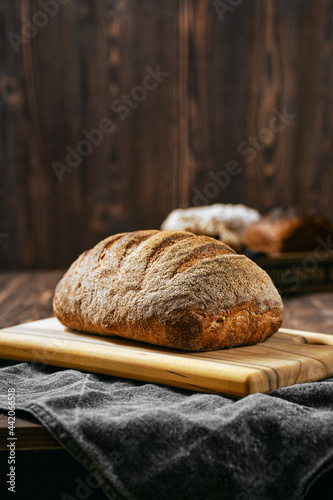 Loaf of artisan sourdough bread with porous texture photo