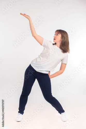 Dancing girl with her hand ...