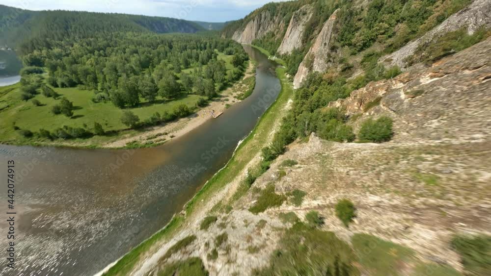 Panorama of the National Nature Park. A boat with fisherman floats on a winding river, which skirts a small island. Wild territory. High quality. 4k footage. Panorama of the National Nature Park. A boat with fisherman floats on a winding river, which skirts a small island. Wild territory. High quality. 4k footage.