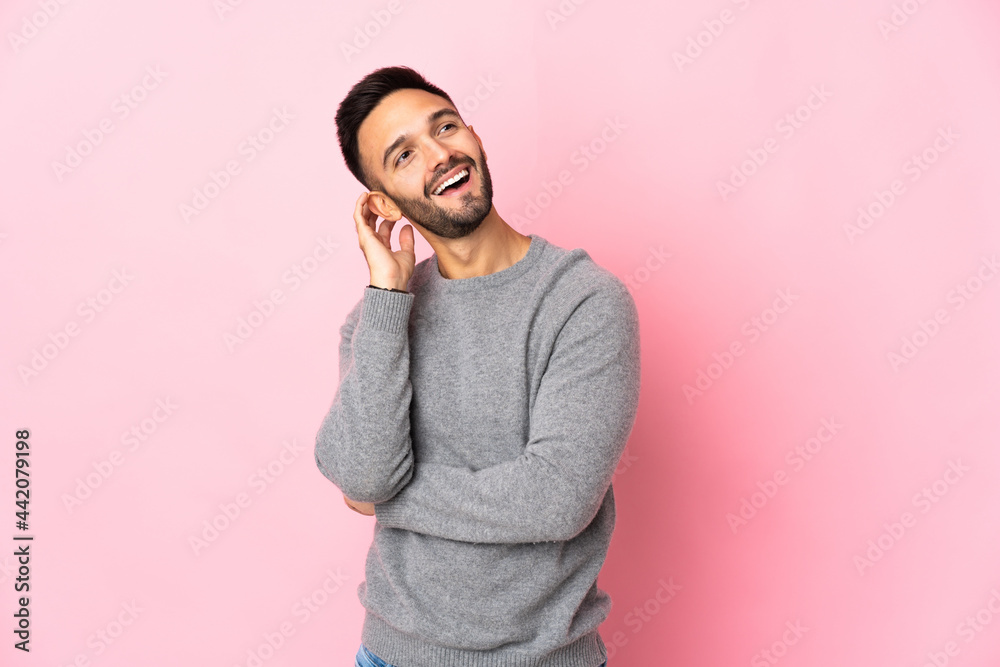 Young caucasian man isolated on pink background thinking an idea Young caucasian man isolated on pink background thinking an idea
