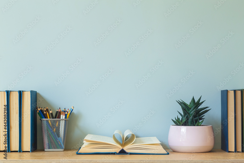 Home office desk table background. Empty wall with wooden table with
