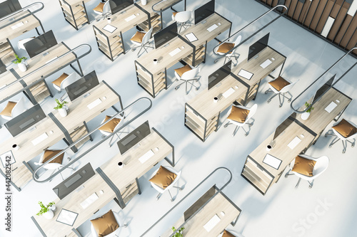 Top view of modern coworking office interior with workplaces. 3D Rendering.