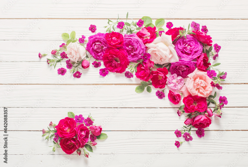 pink and red roses on white wooden background pink and red roses on white wooden background