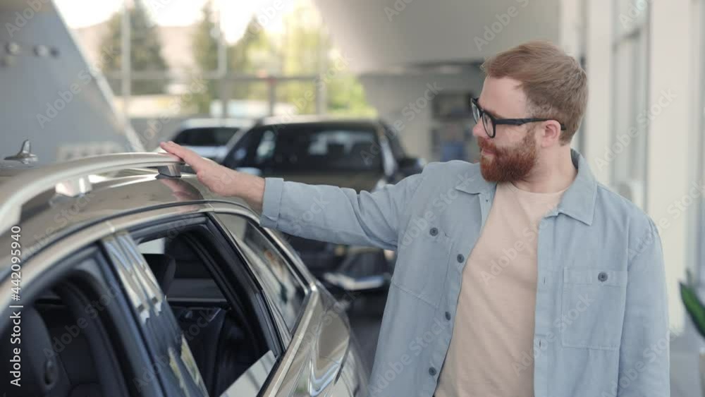 custom made wallpaper toronto digitalHandsome man examining new model of car at dealership