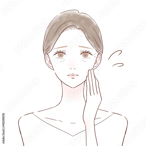 顔の小じわに悩む女性