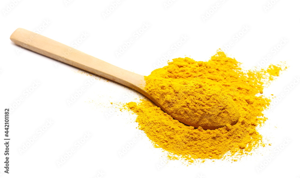 Turmeric (Curcuma) powder pile with wooden spoon isolated on white background Turmeric (Curcuma) powder pile with wooden spoon isolated on white background