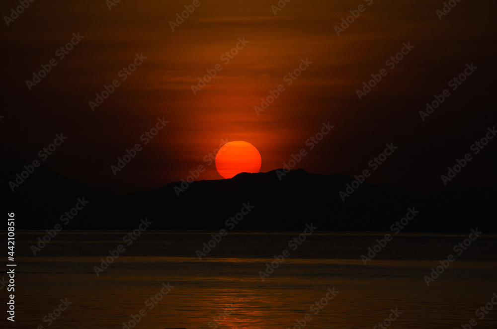 Silhouette island and sea sunrise time. Thailand.