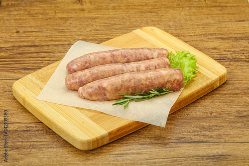 Raw pork meat sausages for grill