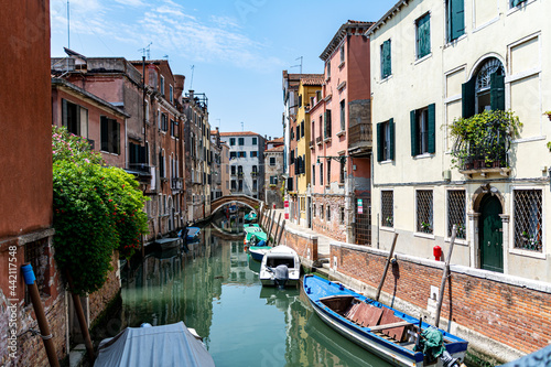 Romanic view of a Water Canal (so-called Riva) in Venice, Italy. These waterways are the main means of transport in the city © Lukas