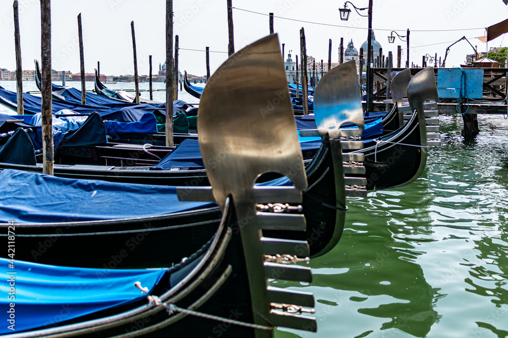 Traditional Gondolas moored in front of the Saint Marks Square in Venice, Italy