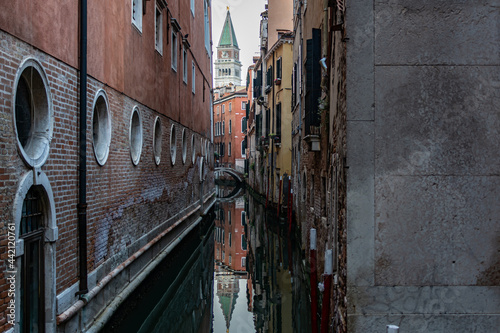 Romanic view of a Water Canal (so-called Riva) in Venice, Italy. These waterways are the main means of transport in the city