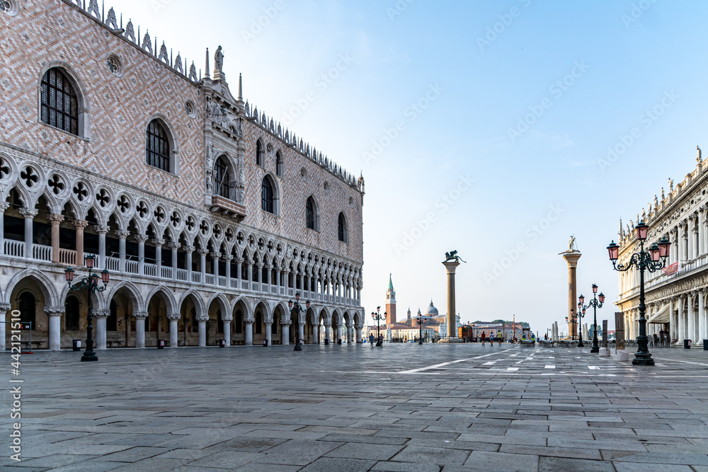 View of Doge's Palace on the St Mark's Square on a beautiful morning in Summer in Venice, Italy