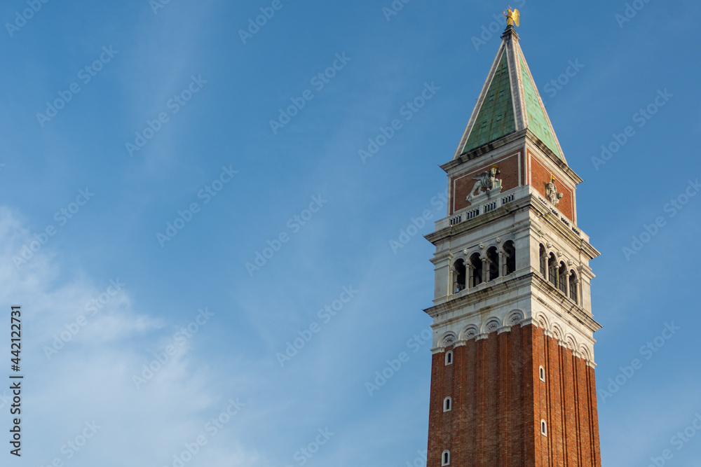 Low angle view of the famous Campanile (clock tower) on St Marc's Square in Venice, Italy