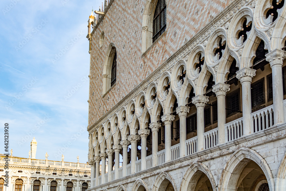 Close up of the front facade of the Doge's Palace on the St Mark's Square on a beautiful morning in Summer in Venice, Italy