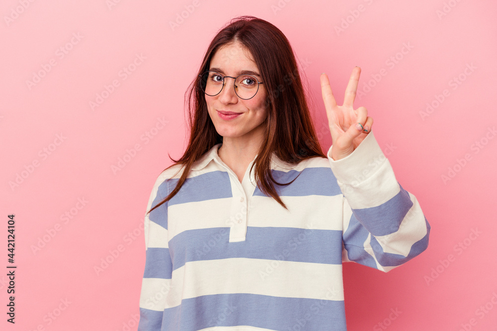 joyful and carefree showing a peace symbol with fingers. joyful and carefree showing a peace symbol with fingers.