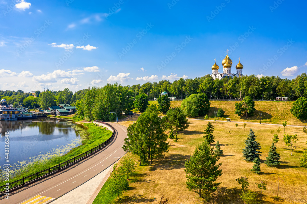 Naklejka premium Aerial drone view of Strelka park and Assumption Cathedral in summer. Yaroslavl city, touristic Golden Ring in Russia.