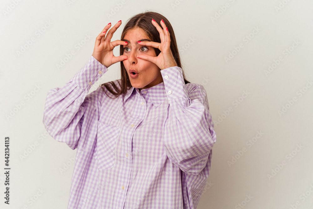 Young caucasian woman isolated on white background unhappy looking in camera with sarcastic expression. Young caucasian woman isolated on white background unhappy looking in camera with sarcastic expression.