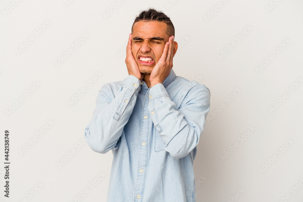 Young venezuelan man isolated on white background whining and crying disconsolately.
