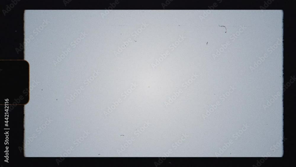 Authentic Super 8 Film Frame Scan with sprocket hole, Film Grain Overlays. For retro vintage look. Noise grain and scratches seamless texture. Old film strip rolling. Edge Lines