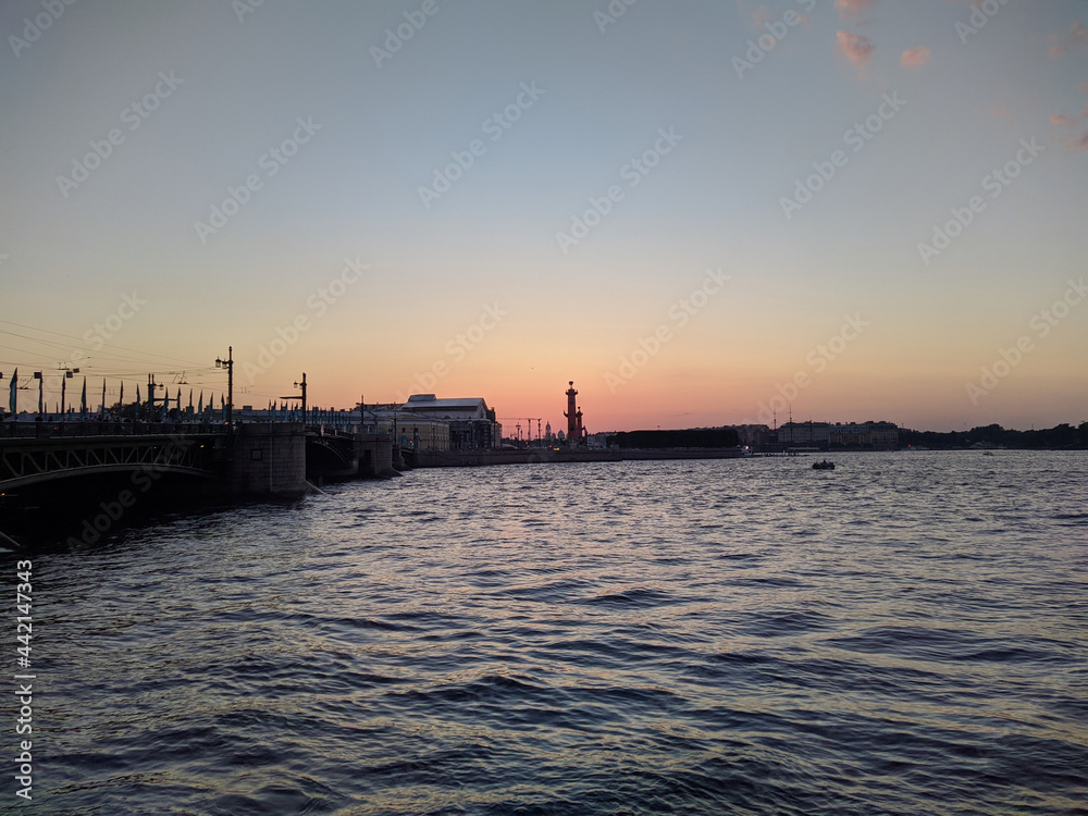 St. petersburg and the neva river in the evening in summer near the bridge.