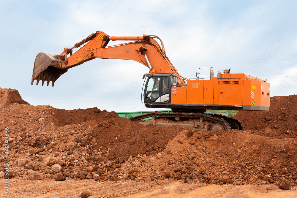 large excavator loads rock with iron or bauxite mining large excavator loads rock with iron or bauxite mining
