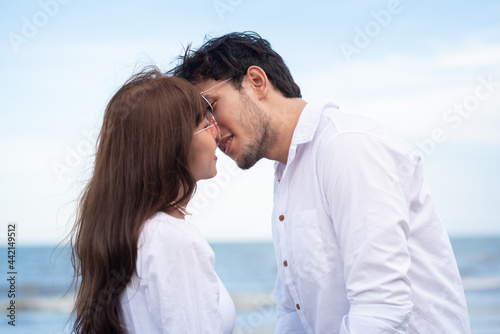 a young couple on the beach.