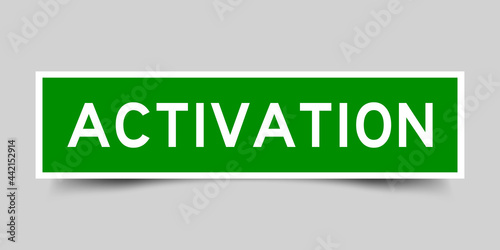 Square label sticker with word activation in green color on gray background