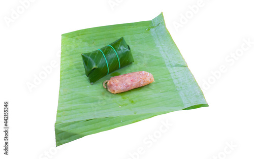 Marinated pork wrapped in banana leaves. Another way to preserve food. Clipping path.