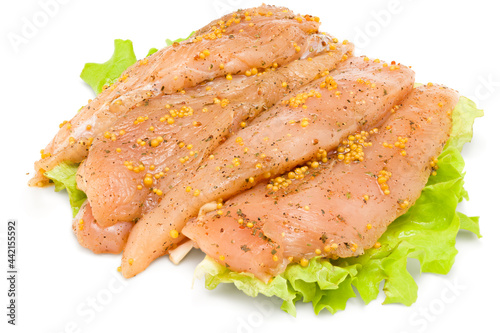Fotografie marinated raw chicken fillet isolated on white background