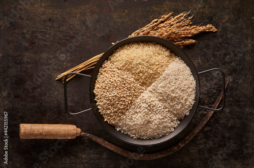 Various types of rice in bowl photo