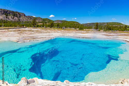 Sapphire Pool hot spring is one of the most beautiful blue pools in the park. Biscuit Basin, Yellowstone National Park, Wyoming