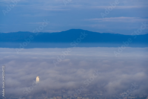 Obraz na płótnie Songkhla, Thailand -June 4, 2020 : Cityscape view in morning time, scene of Kho hong Hill in Hatyai city, Songkla, Thailand. w salonie