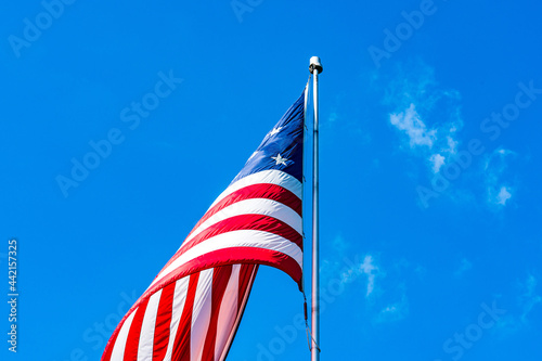 american flag against sky