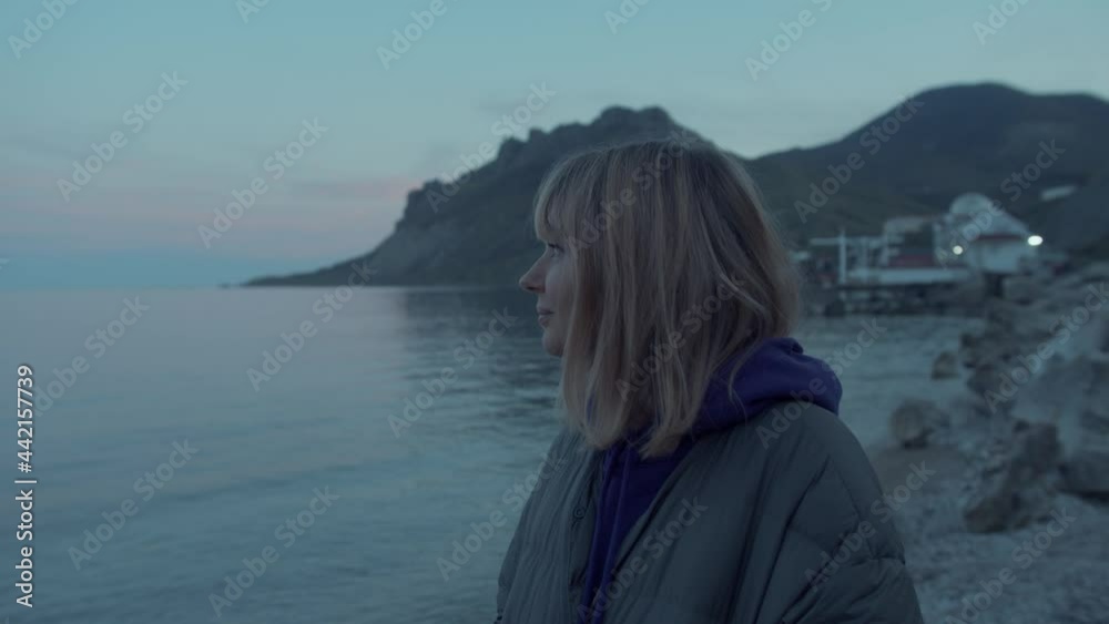 Charming woman on a background of mountain Charming woman on a background of mountain