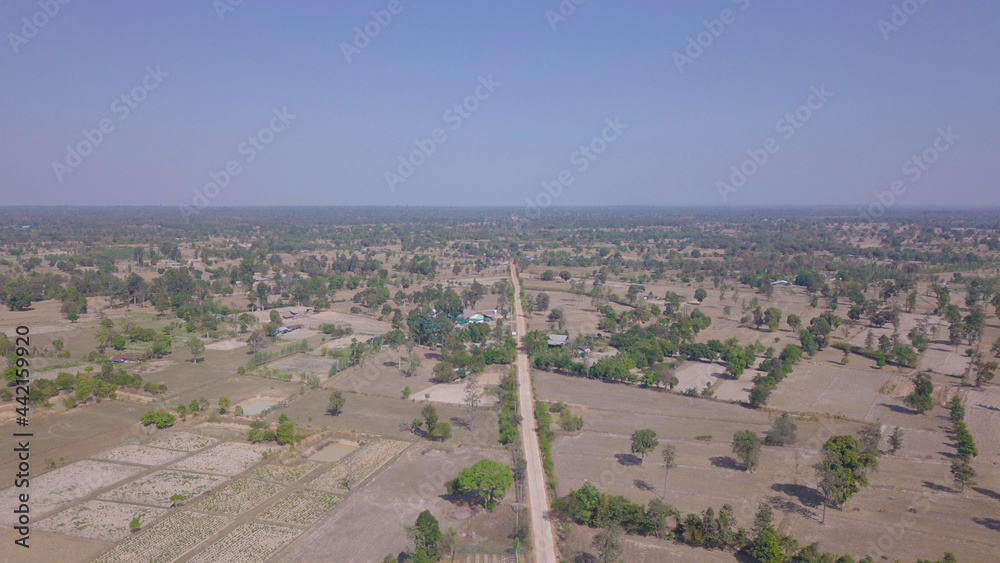 Naklejka premium Road and waste land, taken with a drone.