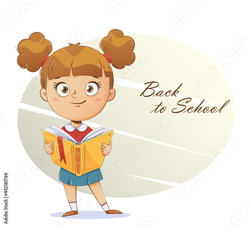 Cheerful schoolgirl holding a book